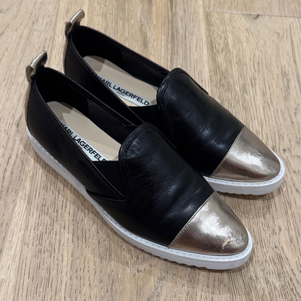 Karl Lagerfeld Black Leather Slip-On Sneakers with Metallic Gold Cap Toe